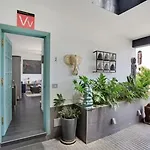 Acogedor En *